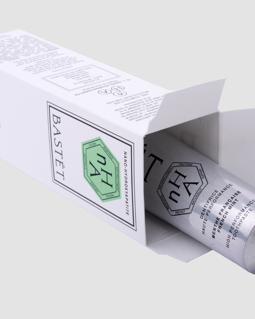 Bastét aluminium toothpaste tube sliding out of its carton